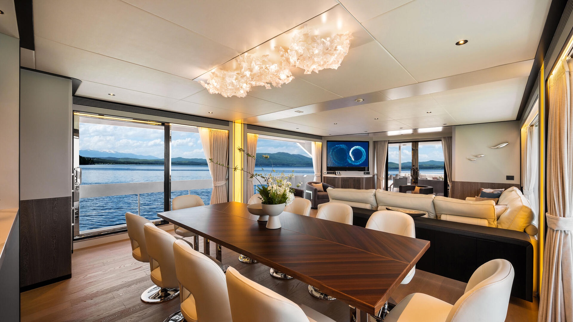 Luxurious Northern Marine yacht interior with rich woodwork and panoramic ocean views